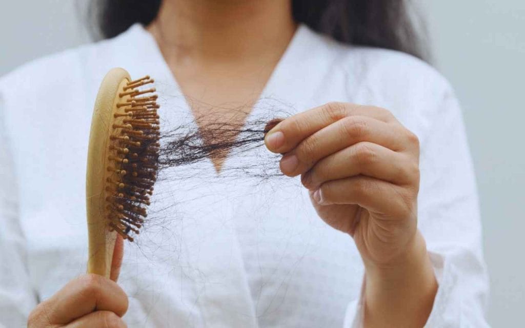 vitaminas para o cabelo parar de cair